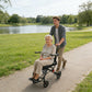 Ultra-Lightweight Foldable Transport Wheelchair – Portable Travel Chair with Handbrakes, 220 lbs Capacity